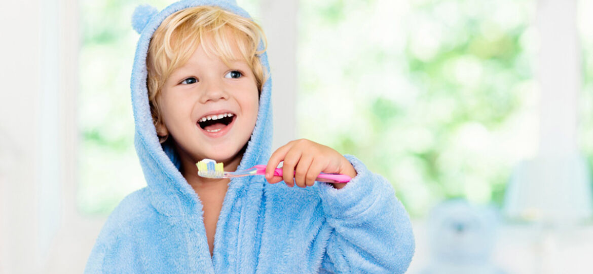 Young Boy Brushing Teeth